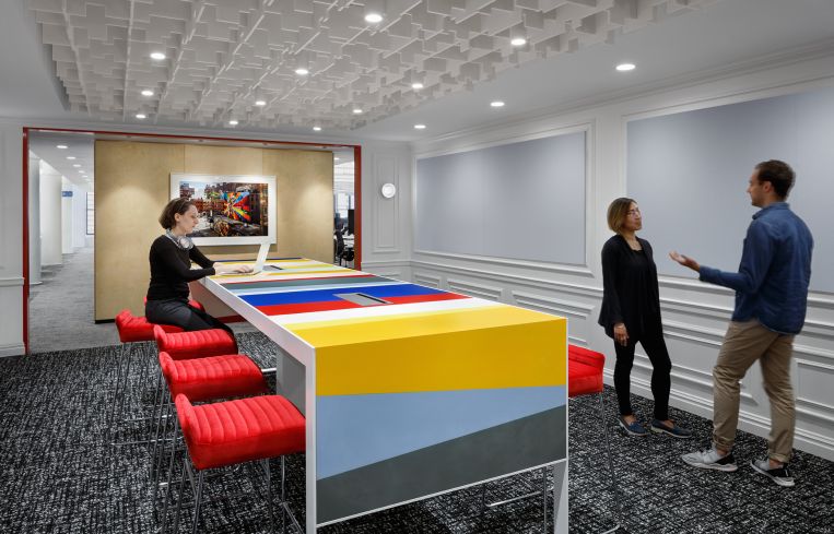 The 3-D printed ceiling in a meeting room is reminiscent of the city skyline.