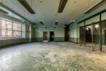 On the ninth floor, an auditorium with a stage and projection room, where visiting thespians would put on plays for sick patients, will be restored with a plaster ceiling and a rounded wood proscenium.
