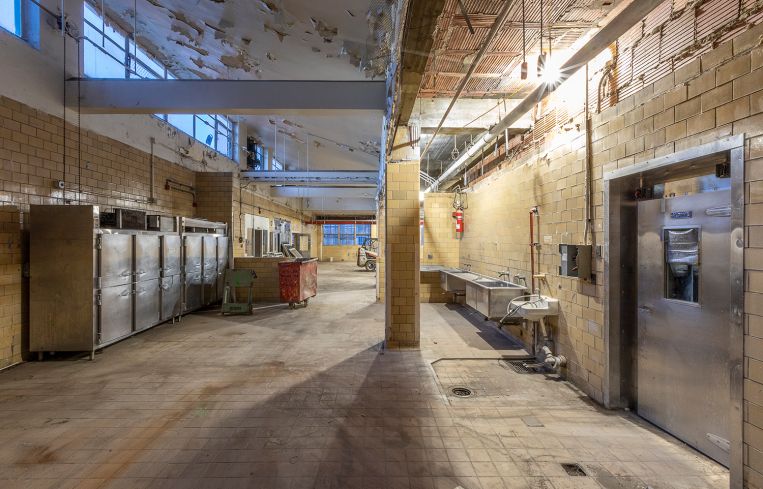 An 8,000-square-foot community center will be repurposed from the property’s industrial kitchen space.