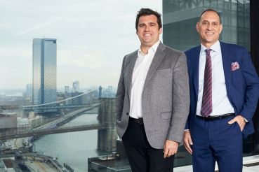 Former Skanska CEO and President Rich Cavallaro, right, is replacing Bill Gilbane III, left, as the executive in charge of Gilbane's New York division.