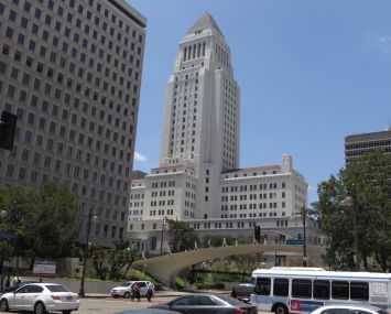 A real estate consultant was charged in bribery corruption scheme involving L.A. City Hall.