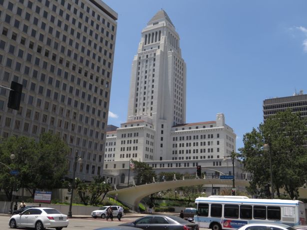 A real estate consultant was charged in bribery corruption scheme involving L.A. City Hall.