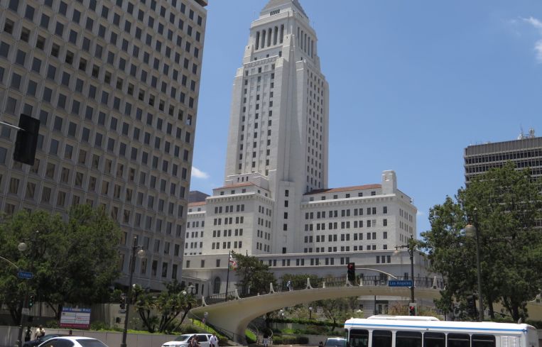 A real estate consultant was charged in bribery corruption scheme involving L.A. City Hall.