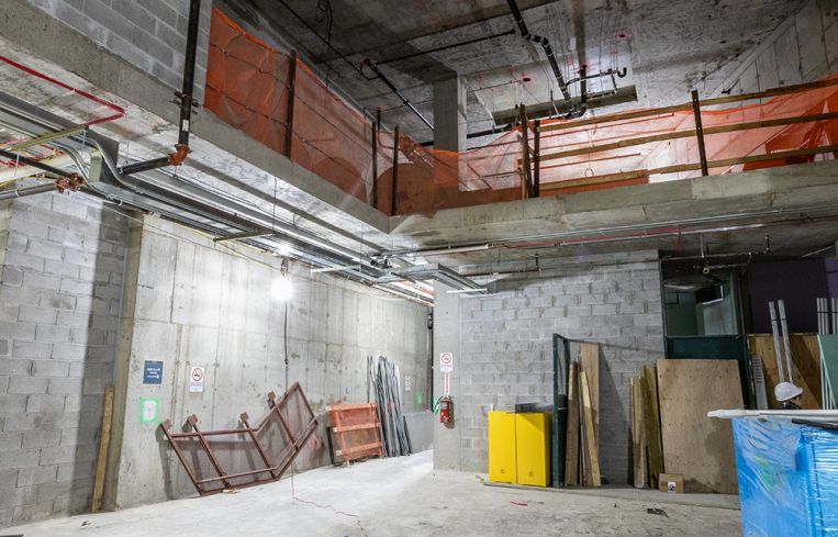 The third floor of commerical space at 25 Park Row features tall ceilings that open to a mezzanine level.