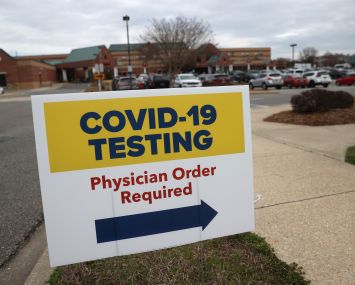 Sign directing patients to a COVID-19 testing drive-up location outside Medstar St. Mary's Hospital in Leonardtown, Maryland.