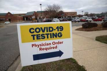 Sign directing patients to a COVID-19 testing drive-up location outside Medstar St. Mary's Hospital in Leonardtown, Maryland.