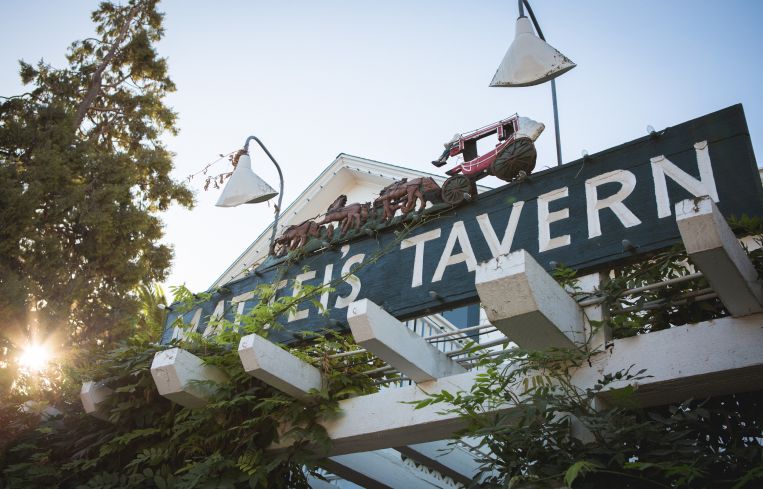 Signage at the front of the original Mattei's Tavern in Los Olivos, Calif.