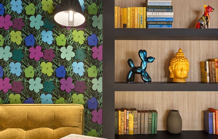 Friedman's new office in One Liberty Plaza includes a long hallway converted to a series of nooks and work areas.