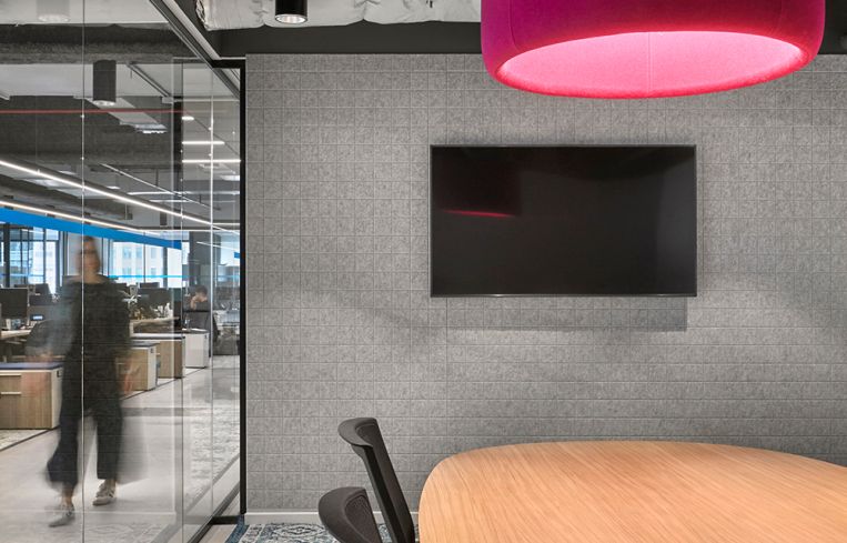 Light fixtures made of acoustic fabric help brighten spaces with fun colors and absorb sound in conference rooms and meeting areas.