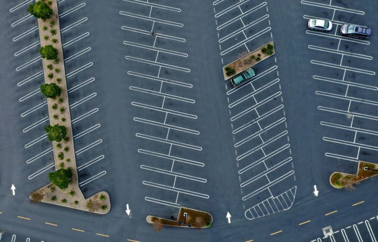 Empty mall parking lot.