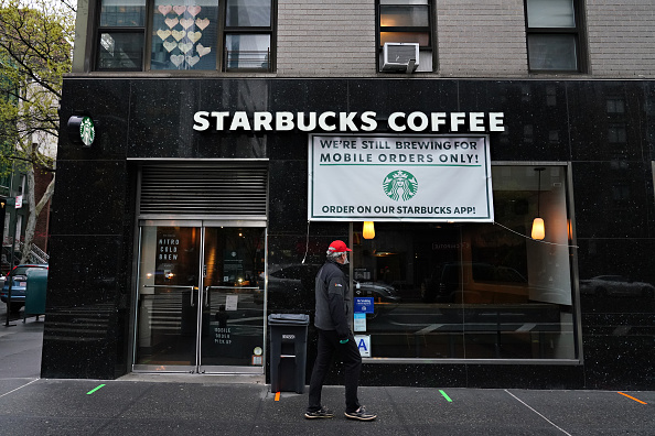 NEW YORK, NEW YORK - APRIL 24: A view of a Starbucks Coffee open only for mobile orders during the coronavirus pandemic on April 24, 2020 in New York City. COVID-19 has spread to most countries around the world, claiming over 196,000 lives lost with over 2.8 million infections reported. (Photo by Cindy Ord/Getty Images)