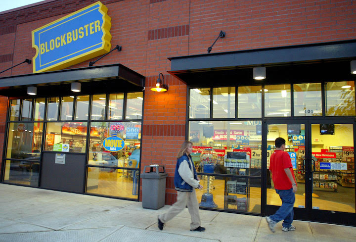 Customers enter a since-closed Blockbuster Video store in Wilsonville, Oregon.