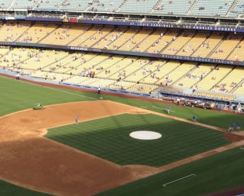 County officials announced that professional sports will do mostly without live audiences, and broadcasters will have to practice physical distancing. Cameras will also be in different locations. Above, Dodgers Stadium in Los Angeles.