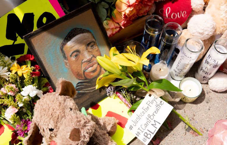 A memorial for George Floyd during the second day of protests over his death in Minneapolis.