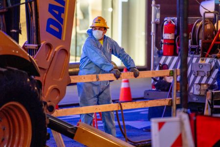 Construction worker with mask in NYC.