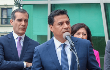 Councilman Jose Huizar, center, was arrested Tuesday.