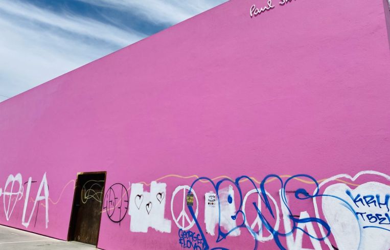The Paul Smith clothing store at 8221 Melrose Avenue typically attracts a line of people who take selfies in front of the pink wall.