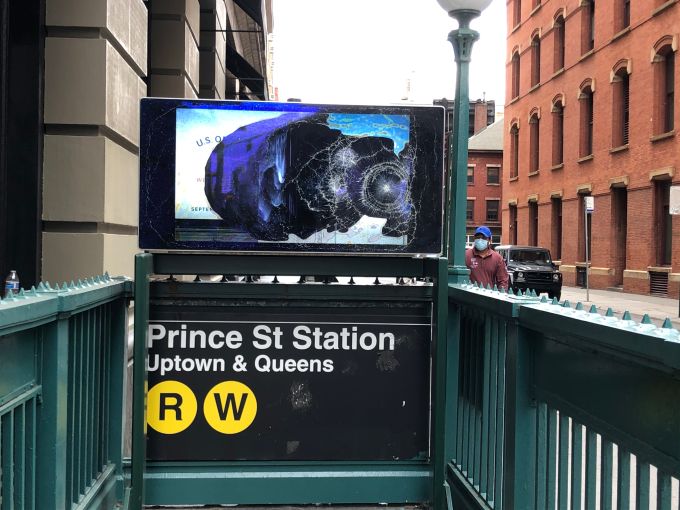 Even the ad screen was smashed at one of the entrances to the Prince Street subway station.