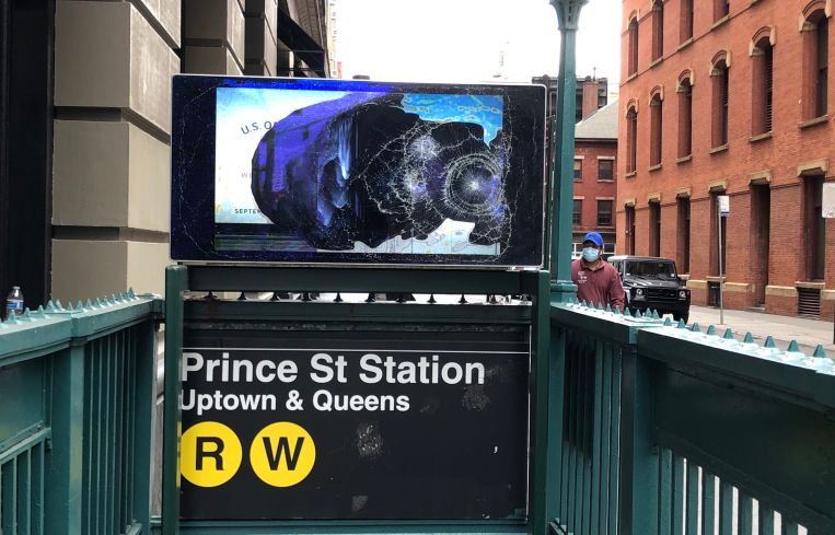 Even the ad screen was smashed at one of the entrances to the Prince Street subway station.
