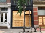 looted birkenstock boarded up
