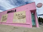 Sorella, a boutique fashion shop located at Melrose Avenue and Orange Grove, was boarded up.