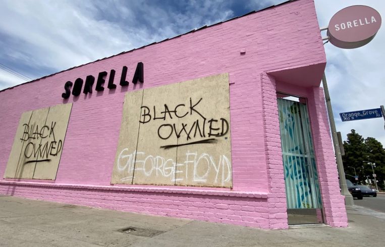 Sorella, a boutique fashion shop located at Melrose Avenue and Orange Grove, was boarded up.