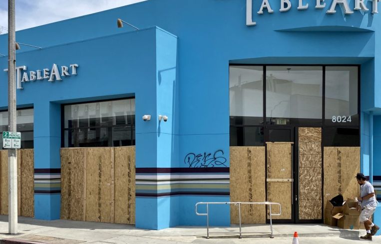 Table Art Inc. at 8024 Melrose Avenue has been boarded up.