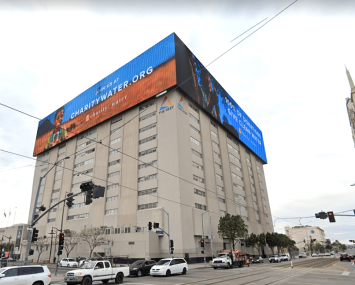 The three digital billboards wrap around the sides of the building, measuring about 55 feet by 245 feet.