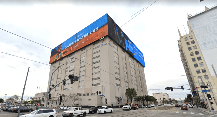 The three digital billboards wrap around the sides of the building, measuring about 55 feet by 245 feet.