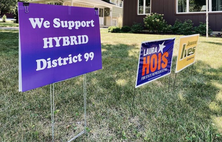 A lawn sign supports a hybrid mix strategy with both in-person and remote learning.