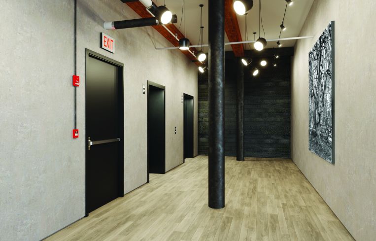 The update also involves exposing original wooden beams in the former factory.