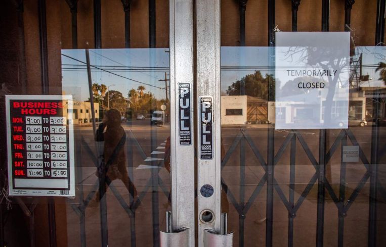 A framing art gallery is closed in Venice Beach in Los Angeles during the pandemic.