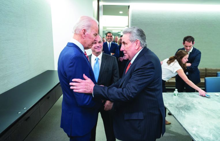 Two men shaking hands.