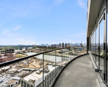 A view of the industrial South Bronx waterfront from the balcony of the newly completed Arches, a two-tower residential project in the Port Morris section of the South Bronx.