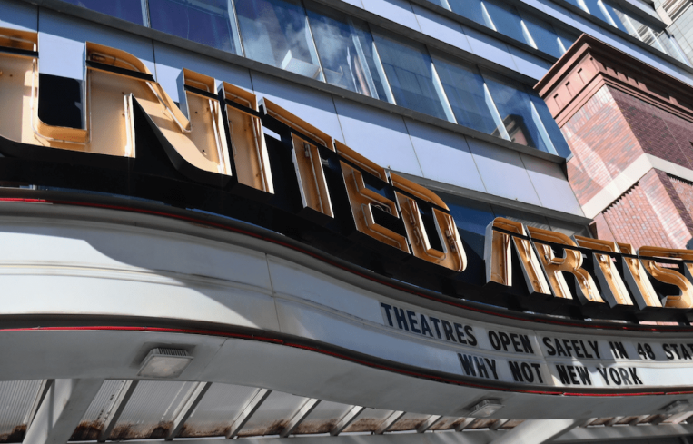 The sign above the Regal UA Court Street & RPX movie theater in New York City laments continued closures due to coronavirus on October 8. With theaters closed in New York and Los Angeles, and would-be movie goers across the country choosing to stay away, U.S. cinemas are sending out a desperate plea for help, which has so far gone unanswered by Congress and studios.