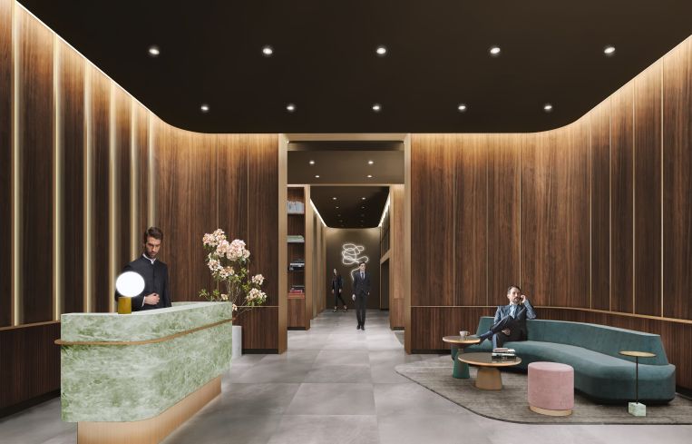 Dark wood paneling with bronze accents will cover much of the lobby, along with a reception desk made of emerald quartzite.