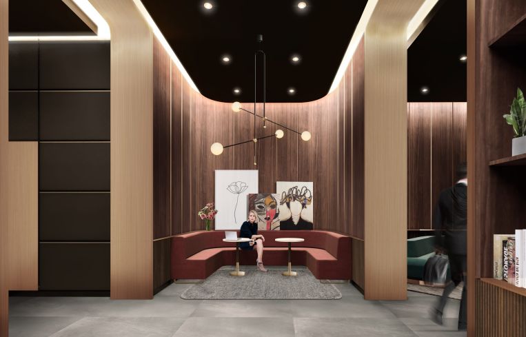 Marx CEO Craig Deitzelweig wanted every aspect of the building to have rounded corners, including the new midcentury style pink and green couches.