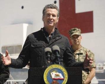 Gov. Gavin Newsom issued the “limited” order that requires nonessential work, movement and gatherings to stop between 10 p.m. and 5 a.m. in counties in the purple tier. That includes Los Angeles County, Orange County and about 94 percent of the state’s population.