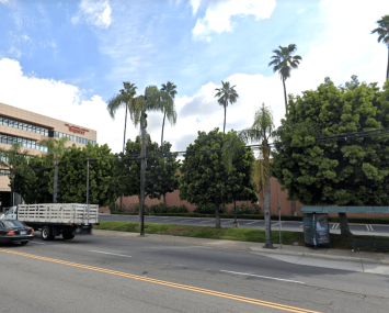 Amazon will demolish the printing plant next to the five-story office to the left, which is still available for sale or lease via developer Michael Harrah.