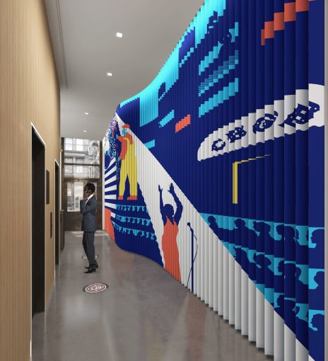 The narrow lobby at 625 Broadway is getting a unique mural painted on a wall of triangular metal blades.