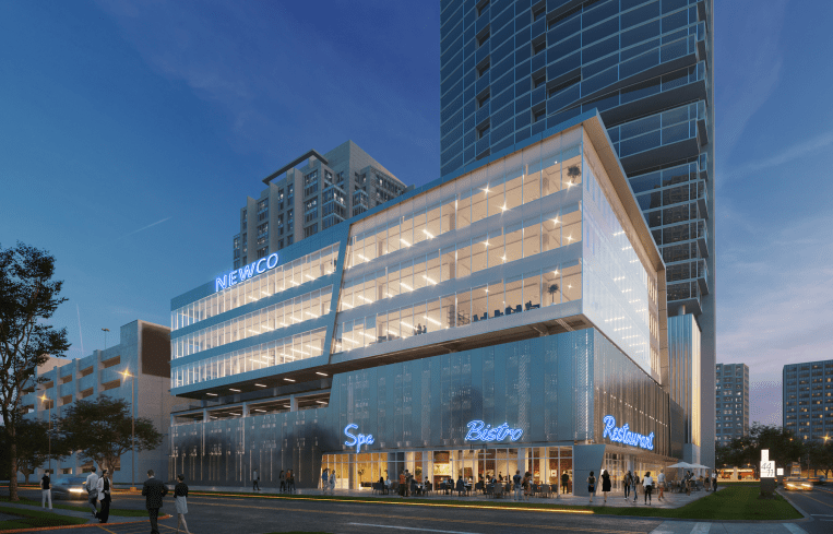 Rendering of a large, boxy building with the lights on.