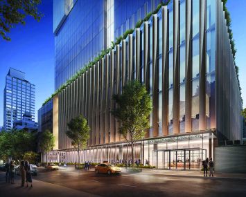 Rendering of a large, boxy building along a sidewalk.