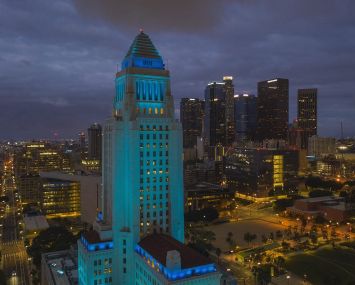 Los Angeles City Hall illuminated in blue in Downtown.