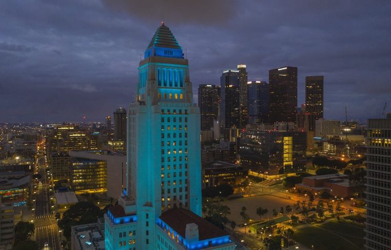 Los Angeles City Hall illuminated in blue in Downtown.