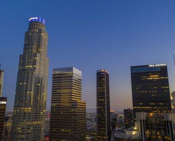 The U.S. Bank Tower, left seen in Downtown Los Angeles in May, shortly before it sold to Silverstein Properties. The tower and other high-rise office buildings have been absent more often than filled with workers since March when Gov. Gavin Newsom ordered Californians to stay home during the coronavirus (COVID-19) pandemic.
