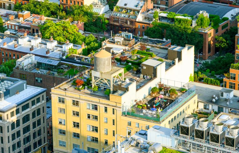 An aerial view of several apartment buildings.
