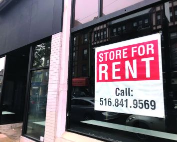 Store for Rent sign, due to Coronavirus Pandemic shutdown and loss of business, Queens, New York