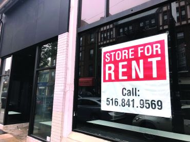 Store for Rent sign, due to Coronavirus Pandemic shutdown and loss of business, Queens, New York