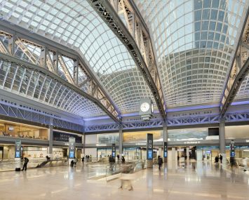 The SOM-designed space repurposes the massive James A. Farley Post Office building as a train hall, with a 115,000-square-foot retail and food hall component that will open later this year.