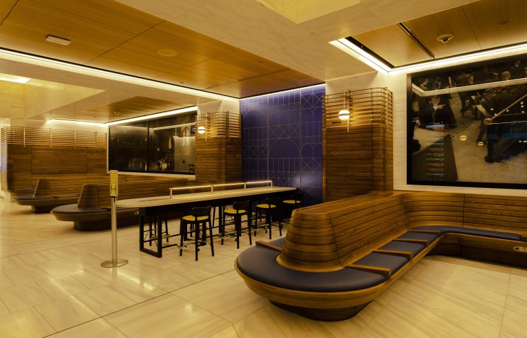 Currently, the lounges are the only seating in the train hall, which does not have public seating.